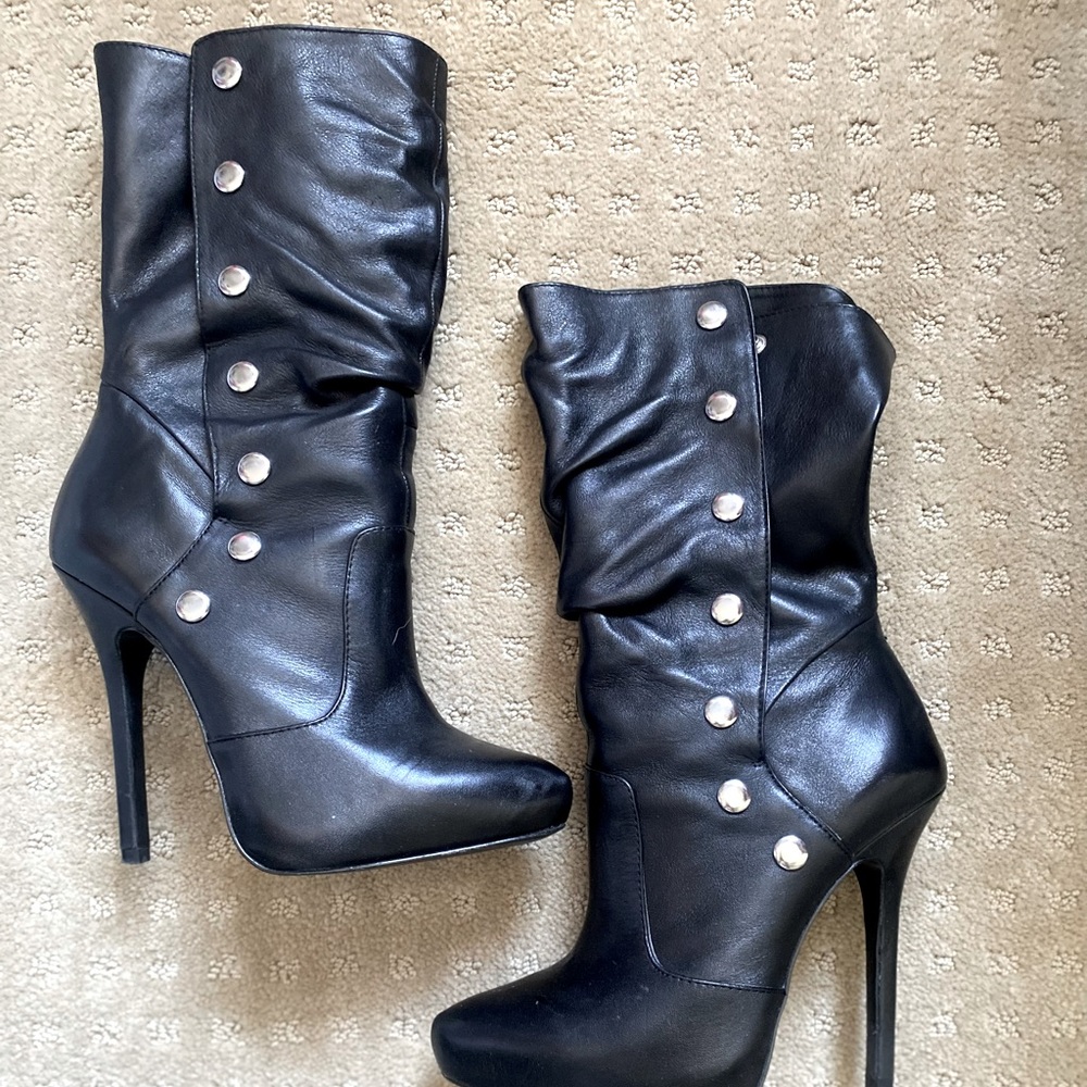 Aldo black heeled boots. Worn twice in great condition.